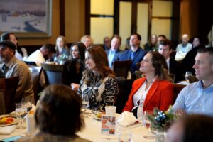 Attendees listen attentively during a Utah Valley Chamber of Commerce event.