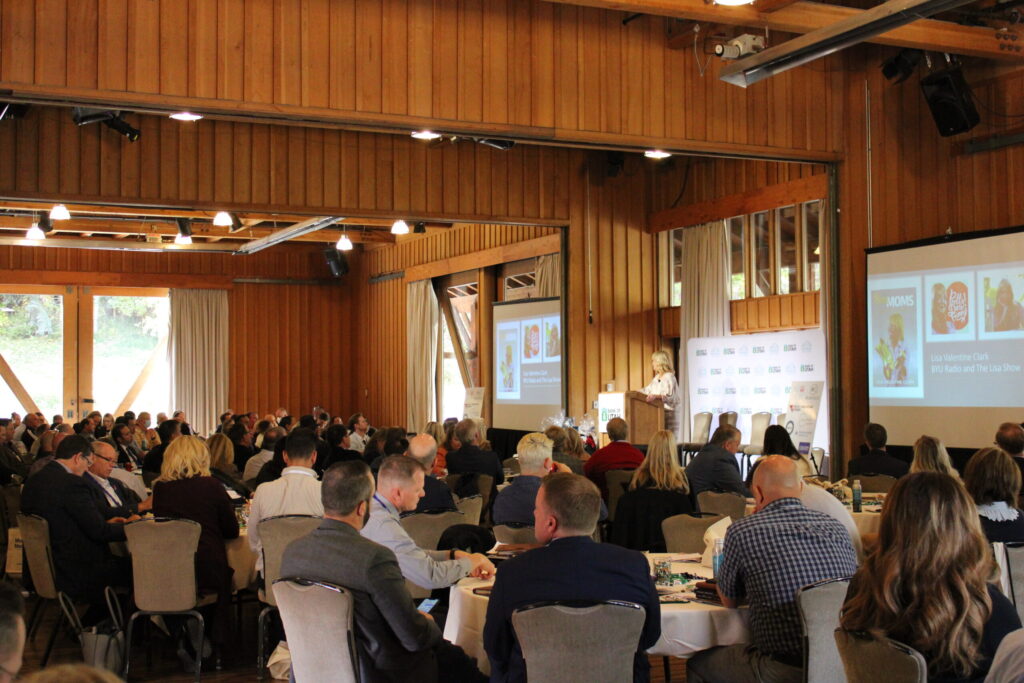 Audience listens to a keynote speaker at the Utah Valley Chamber Executive Summit.
